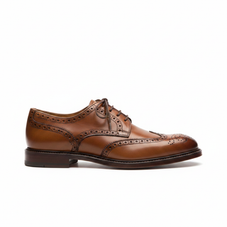Brown leather brogue wingtip dress shoe side view